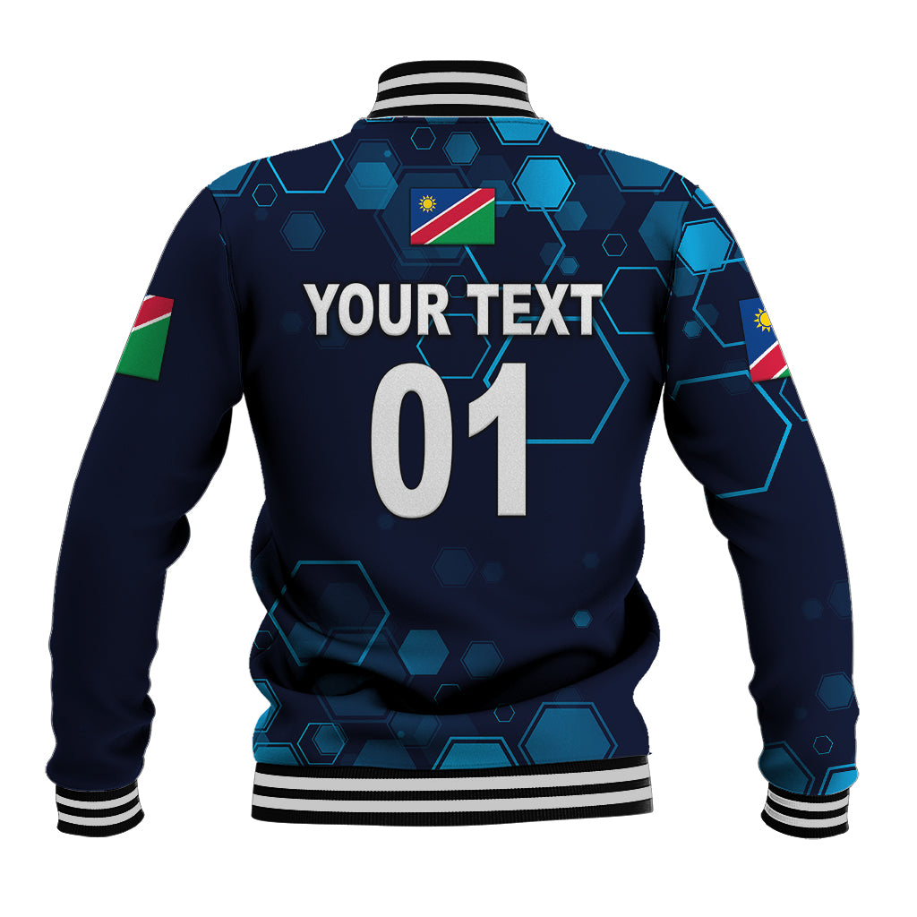 Back of navy baseball jacket with hex pattern, flag patch, 'YOUR TEXT 01' design