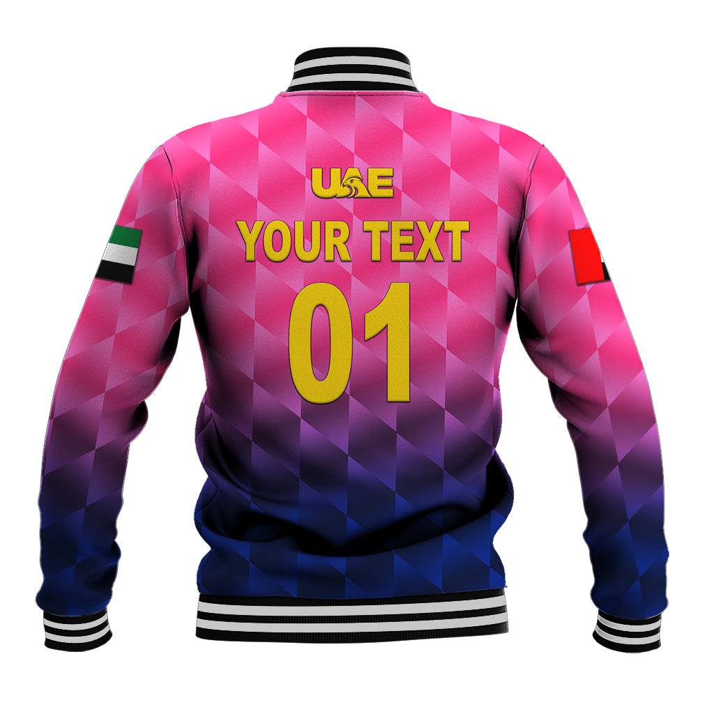 Back of pink baseball cricket jacket with black ribbed hem and large 'YOUR TEXT 01'