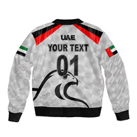 Cricket bomber jacket back, light grey with 'USE YOUR TEXT 01' print and falcon graphic
