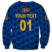 Blue crewneck sweatshirt with check pattern, YOUR TEXT 01 print and crest patch