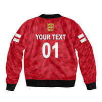 Red bomber jacket back with crest badge, 'YOUR TEXT' 01 print, black ribbed hem.