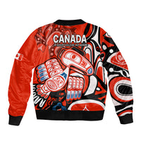 Red bomber jacket with ribbed hem and back graphic with CANADA text and raven