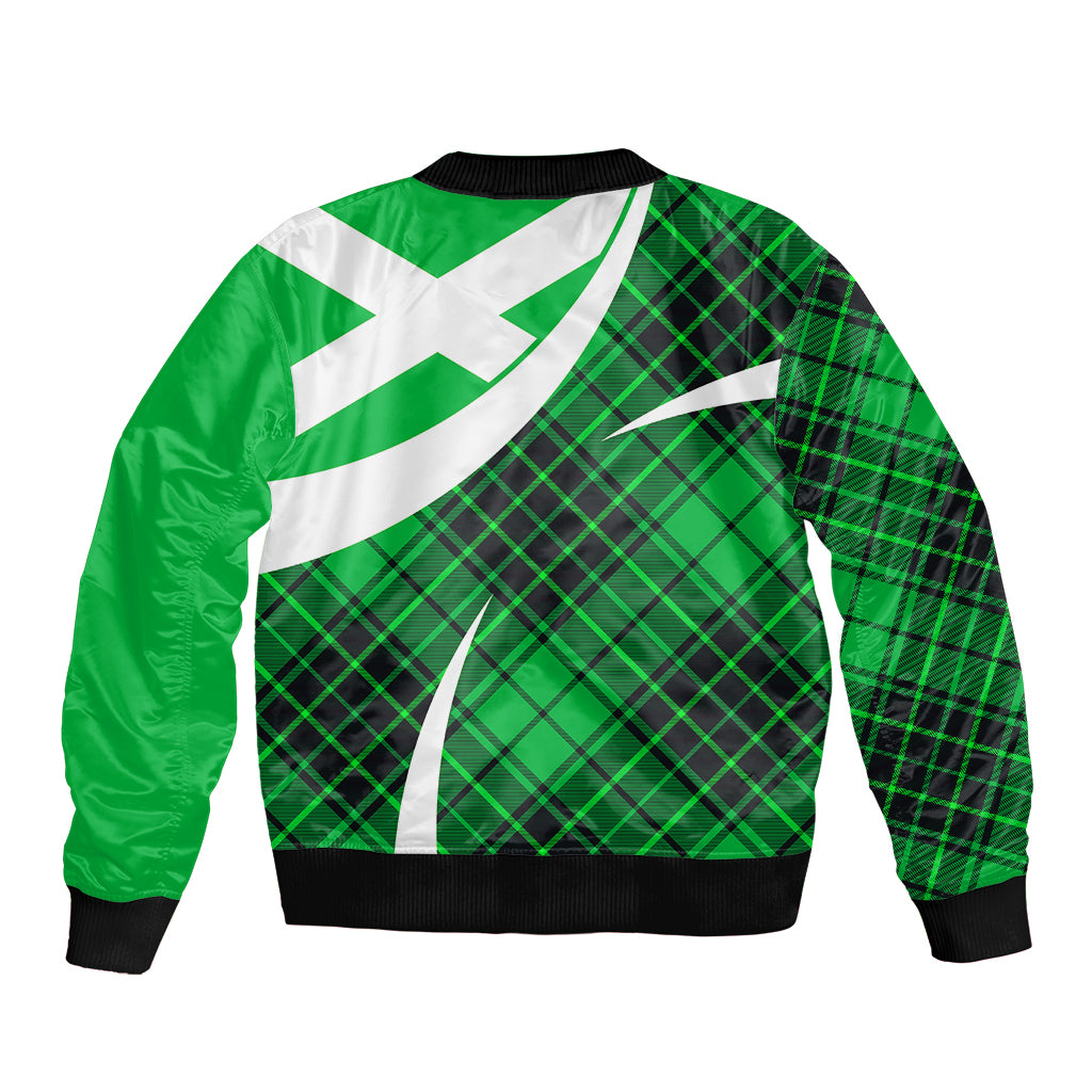 Green tartan bomber jacket with large white diagonal cross, black ribbed cuffs and hem