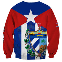 Unisex sweatshirt in blue and red with Cuba crest on back under white star
