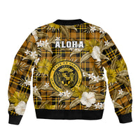 Gold bomber jacket with tropical flowers and plaid, back graphic ALOHA and crest