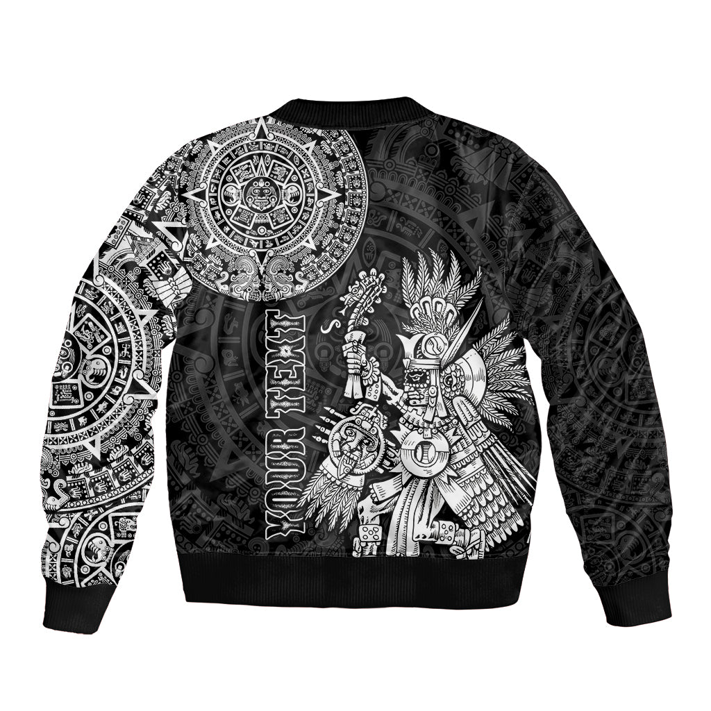Black unisex bomber jacket back with large Aztec sun emblem and tribal warrior print