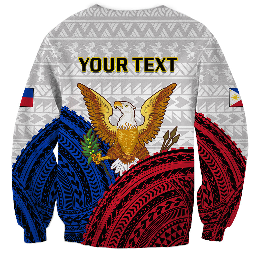 Gray sweatshirt back with YOUR TEXT header, golden bird emblem, red and blue tribal patterns