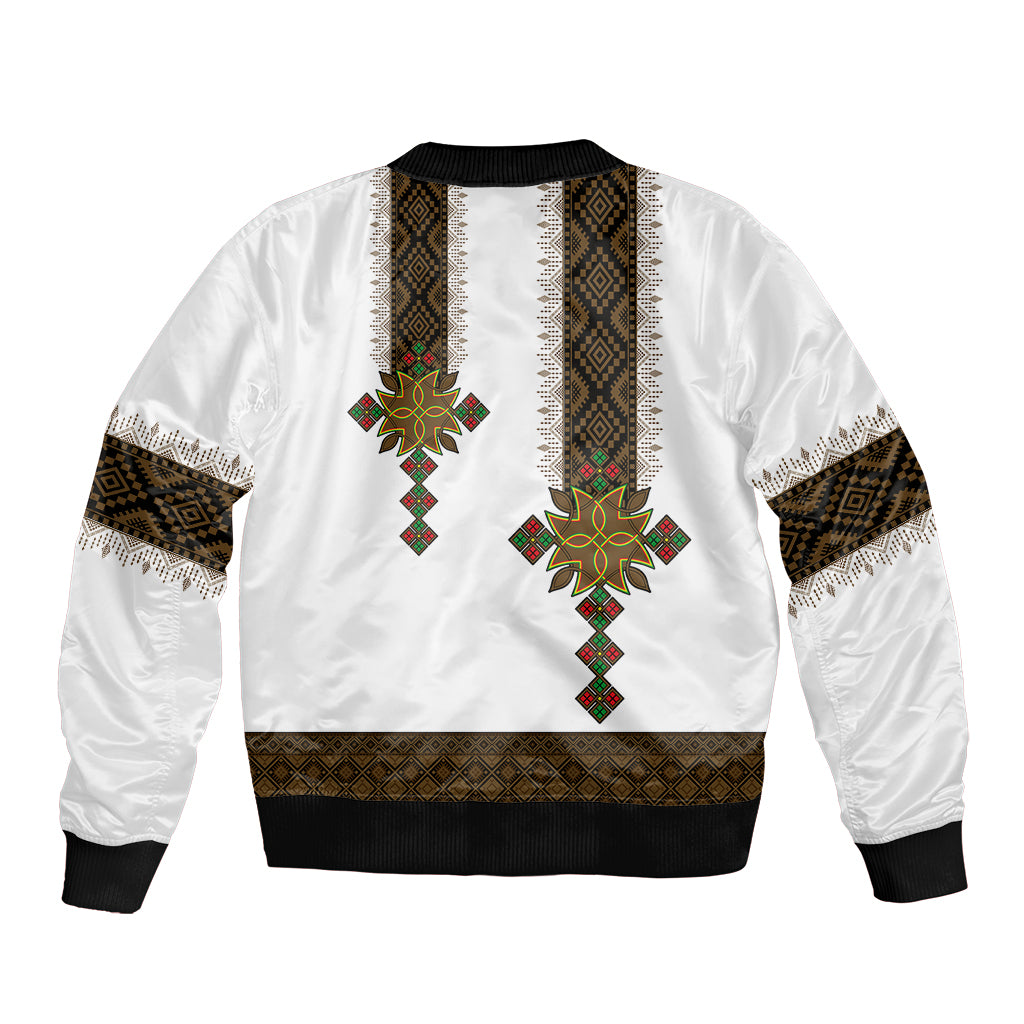 White bomber jacket back with African cross motif, ribbed hem and cuffs