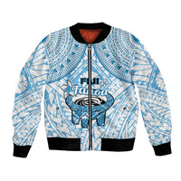 Blue and white bomber jacket with zip front, geometric pattern, black ribbed cuffs and hem.