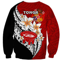 Red and black sweatshirt back with TONGA text, crest emblem, and kava bowl graphic