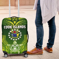 Green Cook Islands luggage cover, side view with elastic corners on rolling suitcase