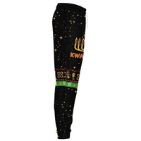 Side view: black jogger pants with gold stars, drawstring waist, colorful holiday band