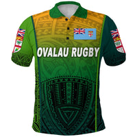 Light green rugby polo front view, yellow shoulder panel, OVALAU RUGBY text and flags