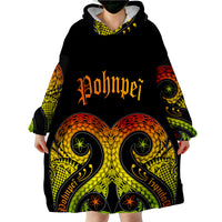 Wearable blanket hoodie, black with owl-like face print in yellow, orange and green