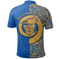 Blue polo shirt back with gold crest, 'Reserve Bank of Vanuatu' text, and R.B.V logo