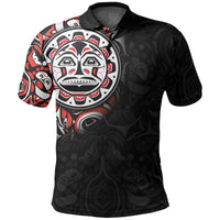 Black polo shirt with Haida-style eagle face graphic and red accents on front.