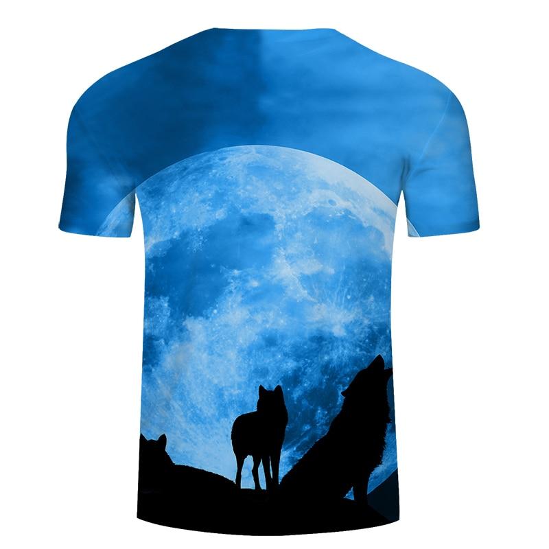 Blue T-shirt with oversized 3D-style moon print and three wolf silhouettes