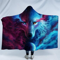 Close-up wolf hooded blanket print with glowing eyes, magenta left and blue right