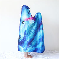 Hooded blanket draped cape style with blue wolf face graphic, side view
