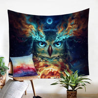 Owl galaxy tapestry with glowing blue eyes, nebula clouds, and cosmic moon design