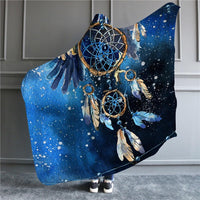 Side view of blue hooded blanket with dreamcatcher and feather galaxy print