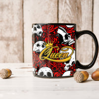 Black 11oz mug with skulls, red roses, and gold cursive text on the side