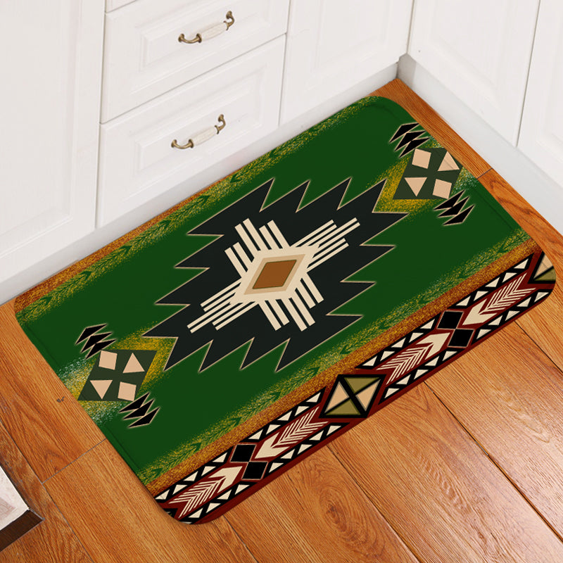 Green southwest native symbol doormat with geometric starburst and zigzag patterns