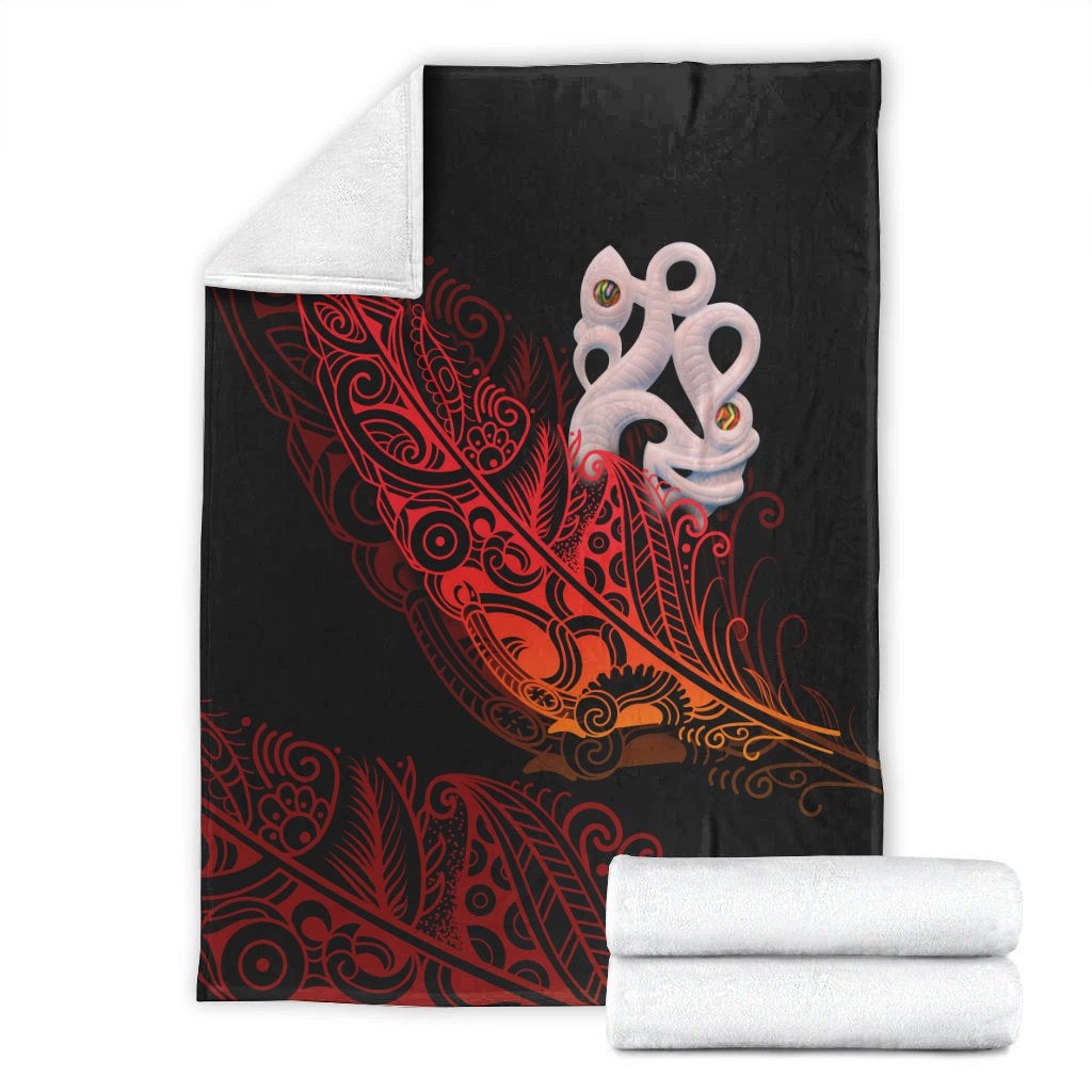 Premium blanket set: black with red fern manaia matau print, folded for storage