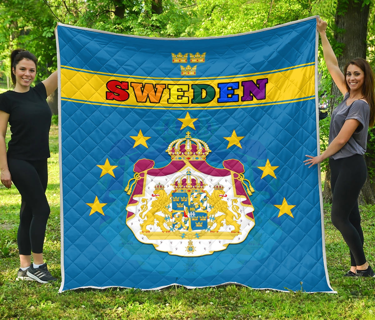 Blue Sweden quilt with yellow stars, coat of arms, and 'SWEDEN' stripe