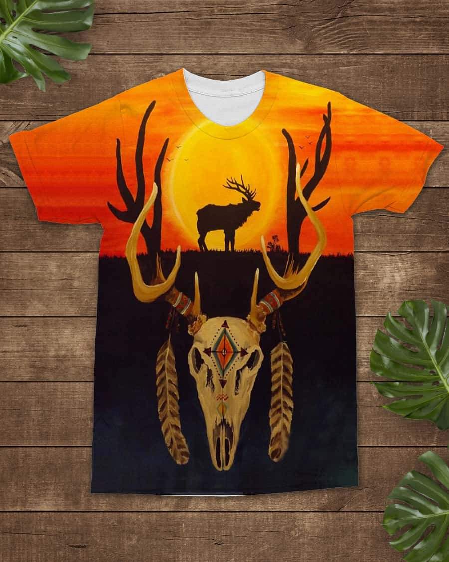 Orange-black crewneck T-shirt with deer skull, feathers, and cacti sunset graphic