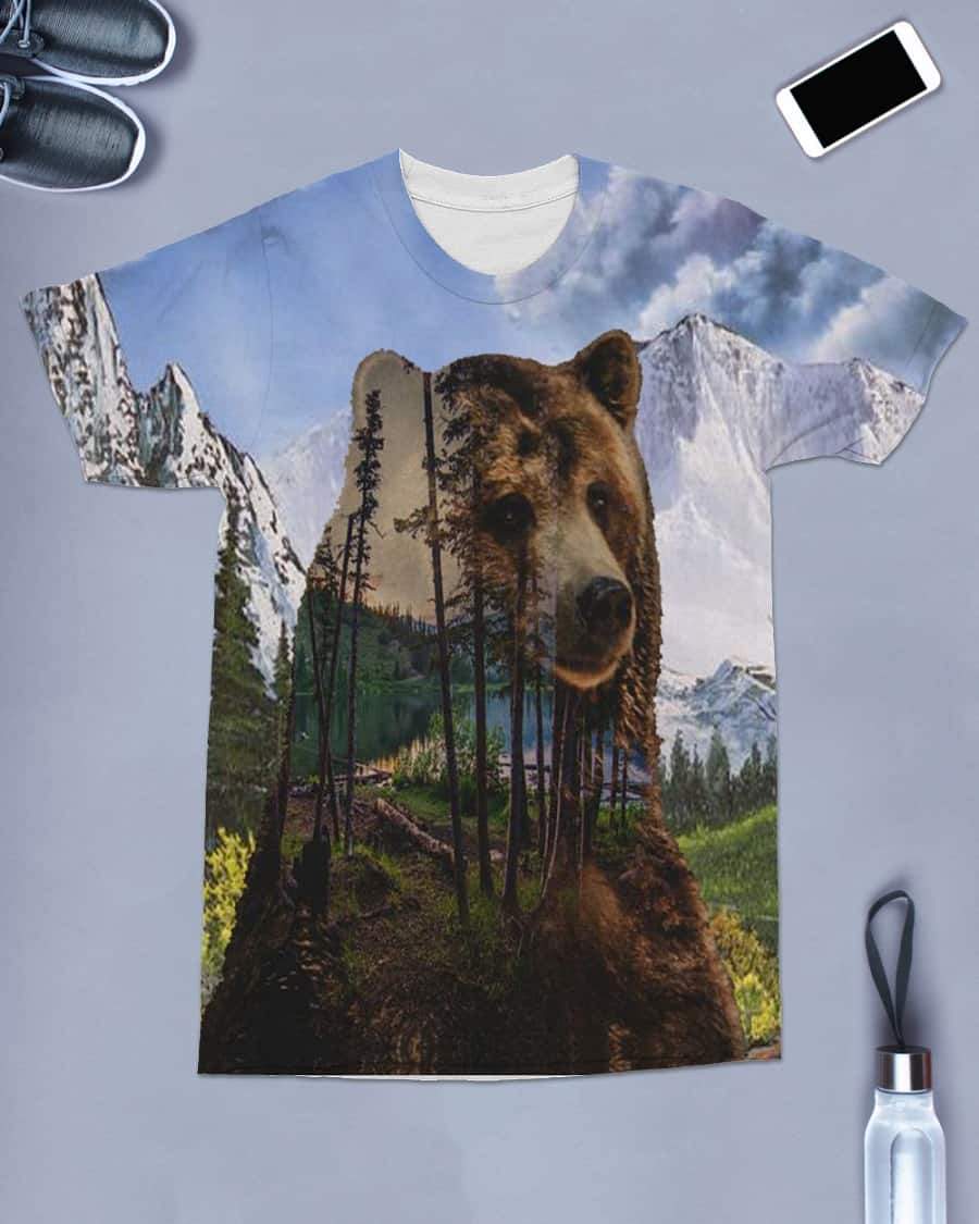 Front view crew-neck T-shirt, multicolor bear portrait over mountain and forest print