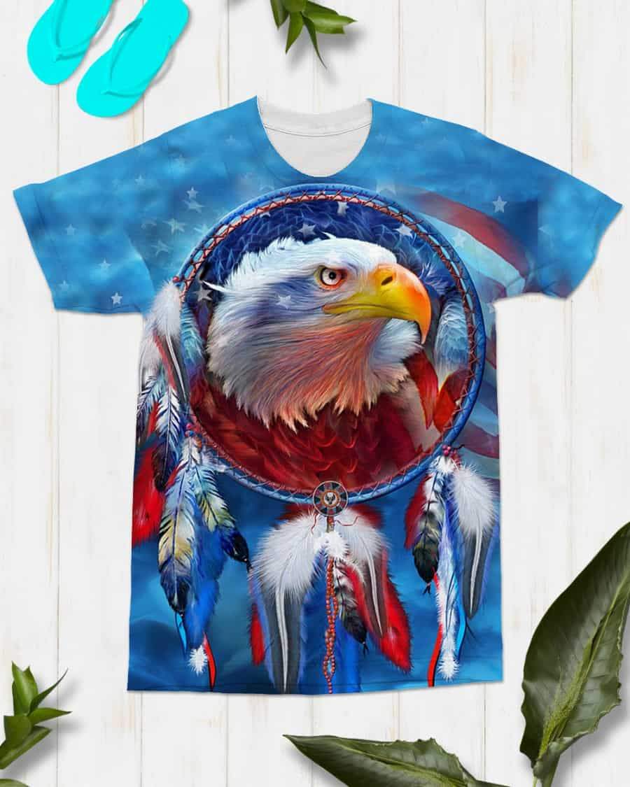 Blue T-shirt featuring close-up eagle face inside dreamcatcher with red and blue details