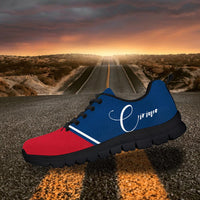 Custom sneakers with blue upper and red toe, dark sole, and white cursive text on side