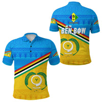 Blue polo shirt with traditional geometric and wave pattern, short sleeves, button collar