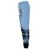 Light blue jogger pants with zebra graphic at hip and black splatter pattern to cuffs
