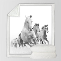 Horses printed throw blanket with monochrome white horses running in a group