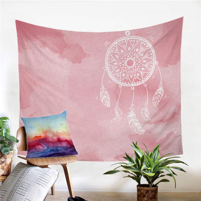 Blush pink dreamcatcher tapestry with circular hoop, geometric feathers, and hanging beads