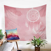 Blush pink dreamcatcher tapestry with circular hoop, geometric feathers, and hanging beads