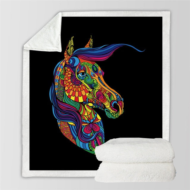 Colorful horse head print on dark throw blanket with bold multicolor swirls