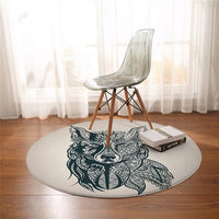 White round wolf carpet with detailed blue wolf face and symmetrical geometric accents