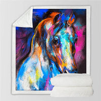 Horses printed throw blanket with neon paint-style horse heads and manes