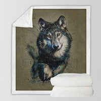 Sherpa blanket featuring a blue-black wolf face with yellow eyes; white plush sherpa.