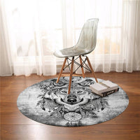 Round black-and-white wolf rug with detailed face art and dreamcatcher motifs