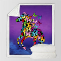 Horses printed throw blanket with colorful mosaic-style horse artwork and butterflies