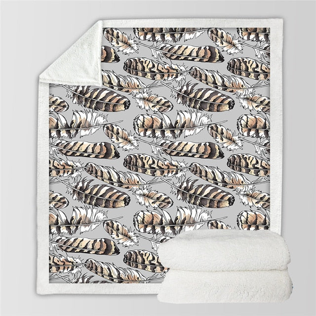 White blanket with leopard-feather pattern and white sherpa backing