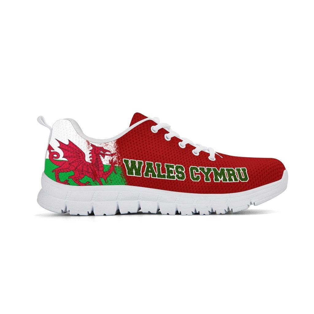 Red athletic sneakers with white sole, Wales Cymru text on side, and dragon graphic