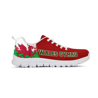 Red athletic sneakers with white sole, Wales Cymru text on side, and dragon graphic